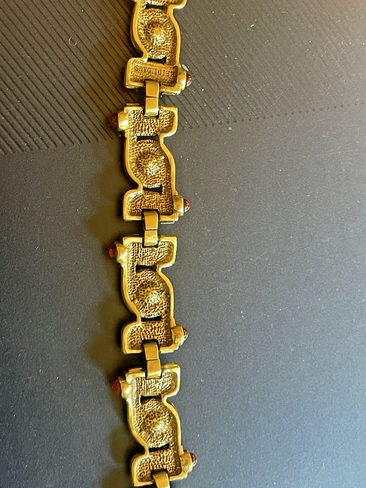 New Heidi Daus Bracelet in Original Packing. Olive Green, Red, Yellow Crystals.