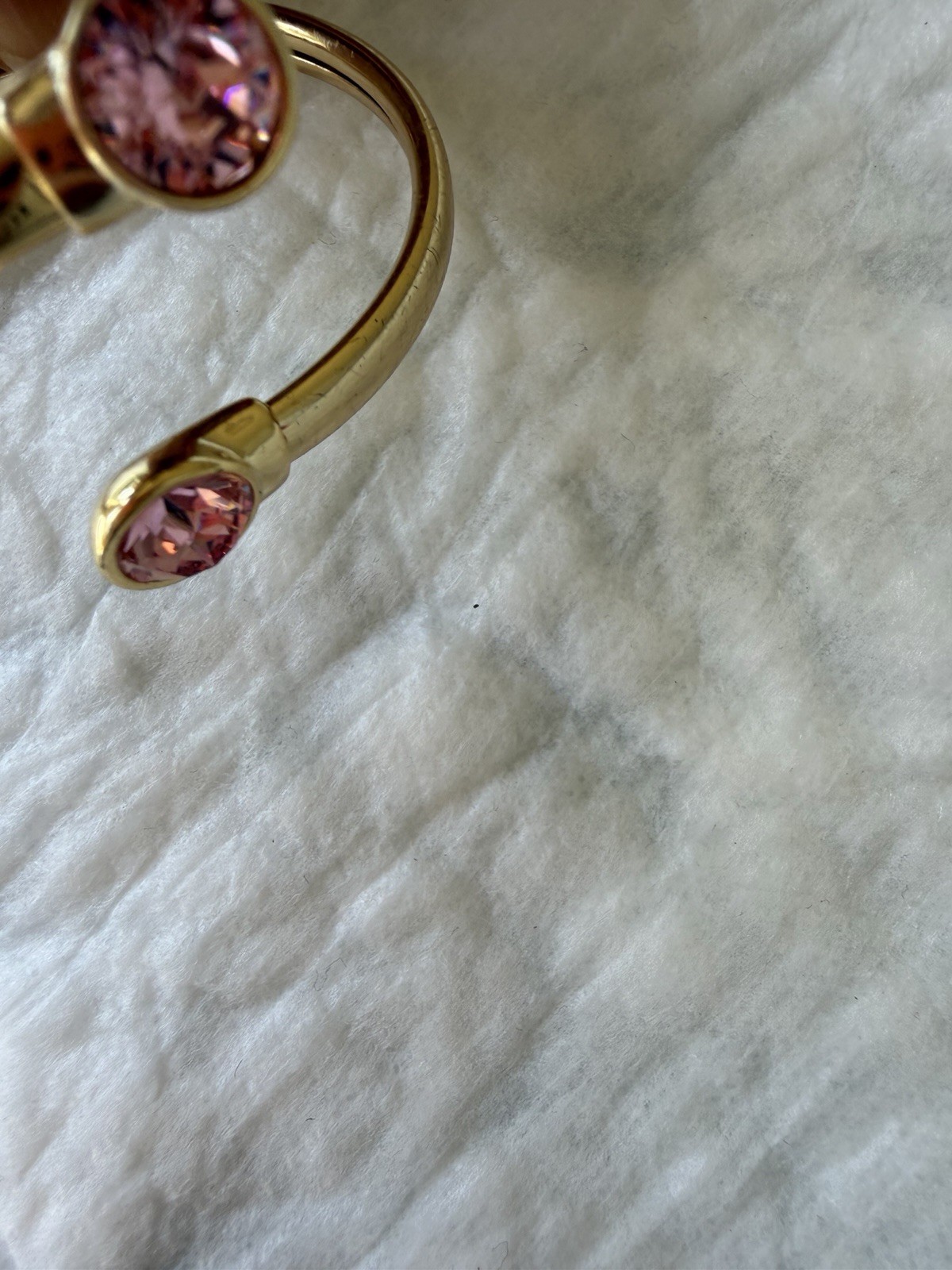 Goldtone Open-Ended Bangle Bracelet with Pink Gemstone Accents