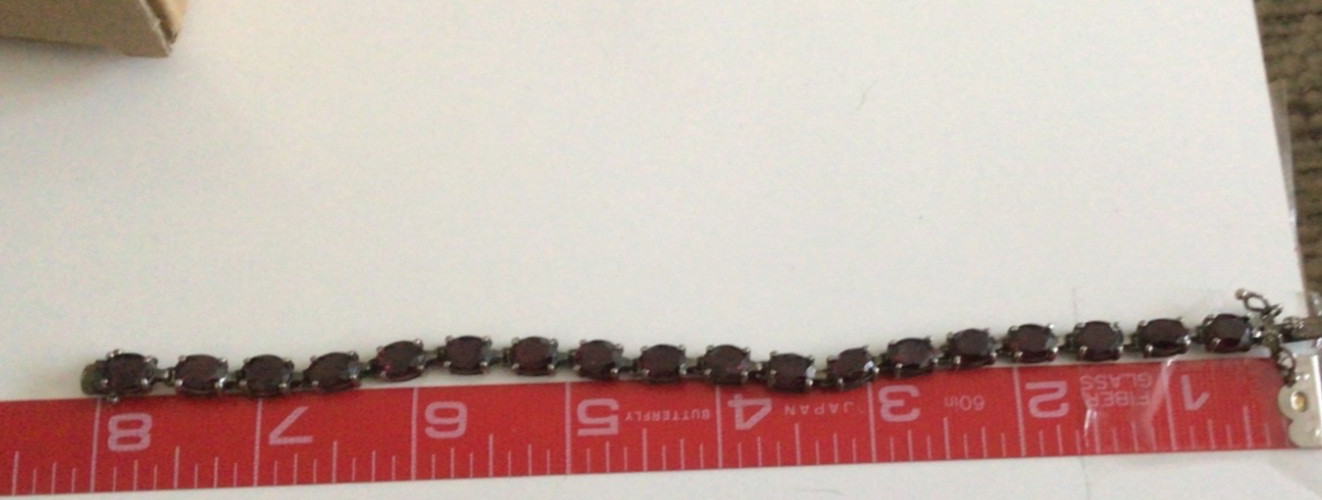 STERLING SILVER & GARNET 8” BRACELET – MARKED 925 CNA THAILAND