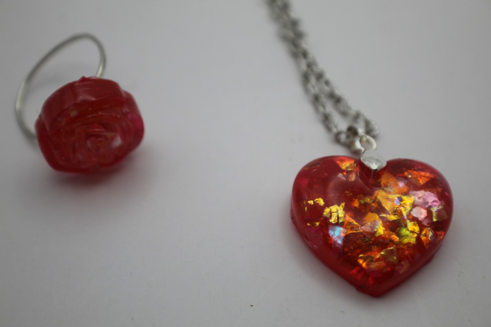 Shiny Red Heart Shaped Resin Pendant On A Chain Necklace With Matching Ring