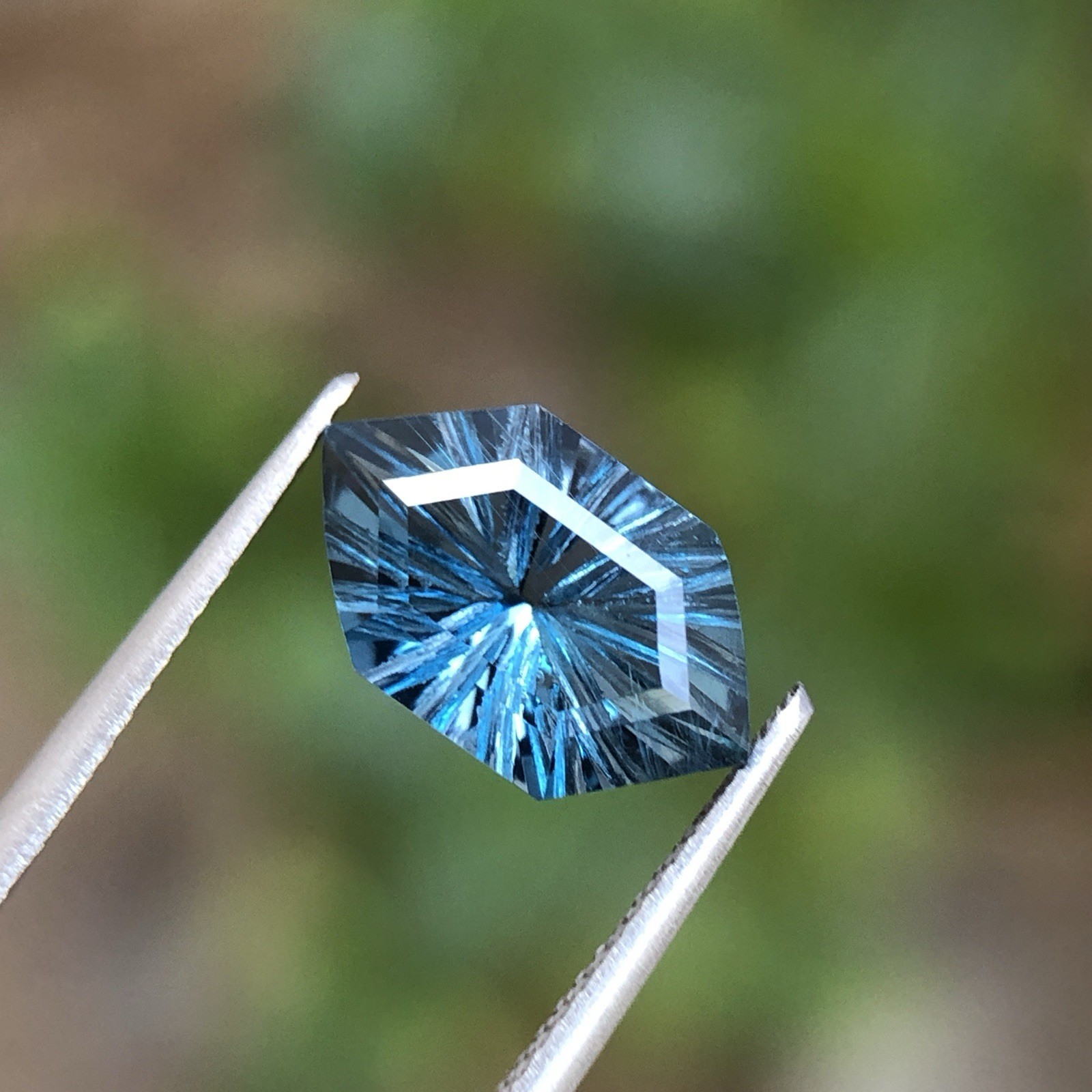 Natural London Blue Topaz Fantasy Cut Long Hexagon 12.5 MM 3.90 Carat.