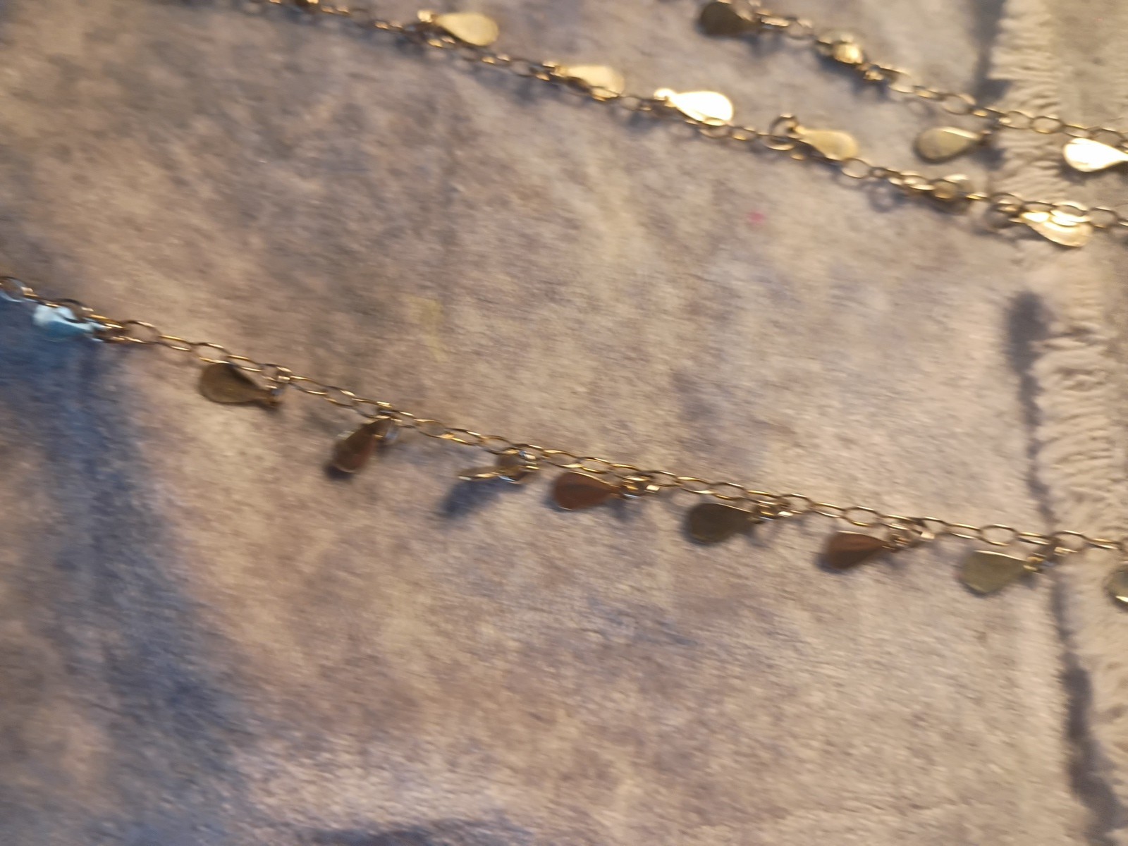 Gold Toned Tear Drop Charmed 56 Inch Taper Single Strand Necklace. J2
