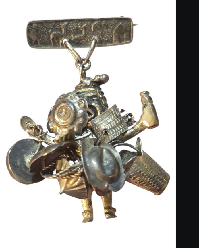 Peruvian Man Sells His Wares Charms .925 Guaranteed To Be Sterling Brooch/Pin