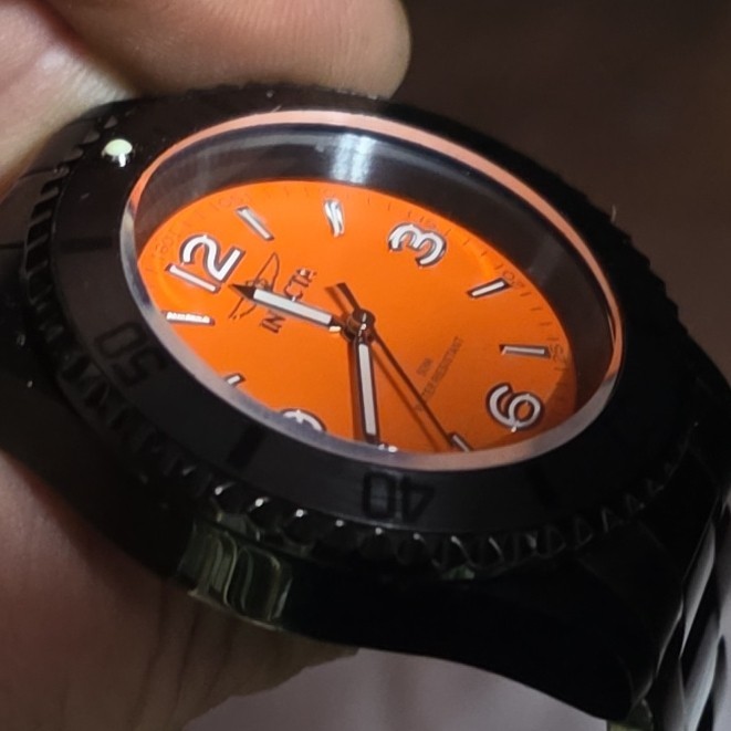 Invicta Men’s Quartz Analog Wristwatch 100m 44-47.9mm Orange Dial Black