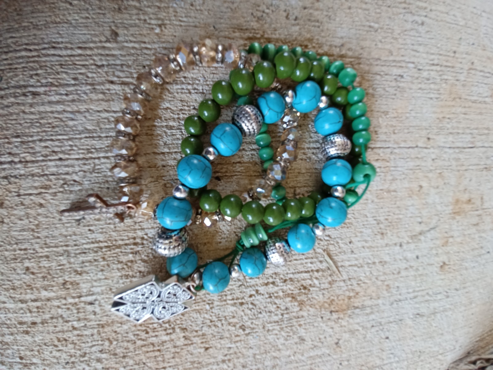 multi-strand bohemian bracelet stack features turquoise-colored magnesite beads
