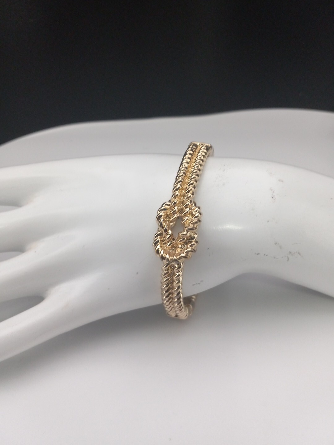Gold Tone Love Knot Textured Twisted Design Size 7 Push Lock Bracelet