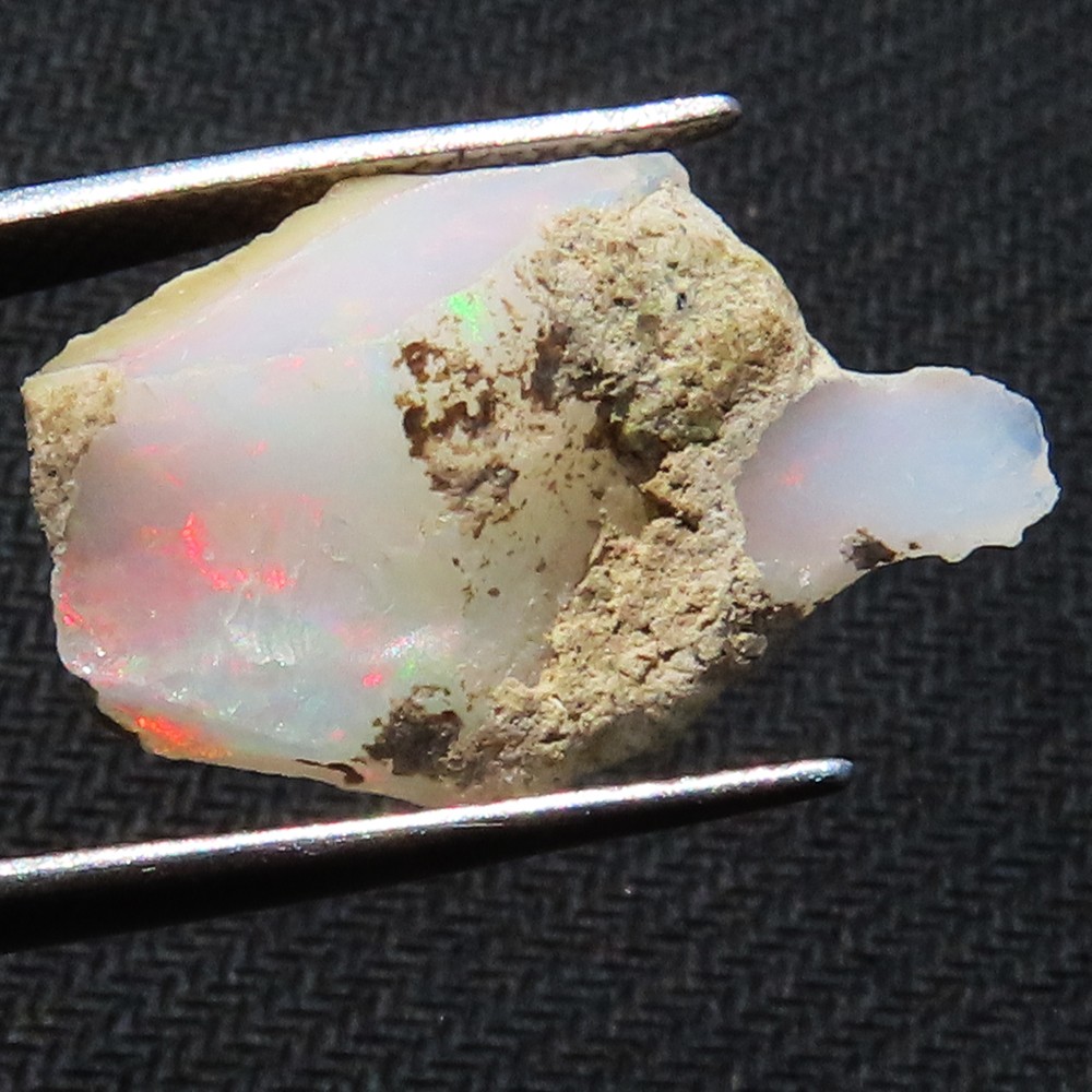 NATURAL PLAY OF COLOR ETHIOPIAN OPAL ROUGH GEMSTONE 8.20 Cts. (14x22x08 mm) M_05