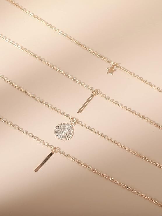 Four (4) Layered Multi Chain Gold Necklace, Column, Pendant and Star