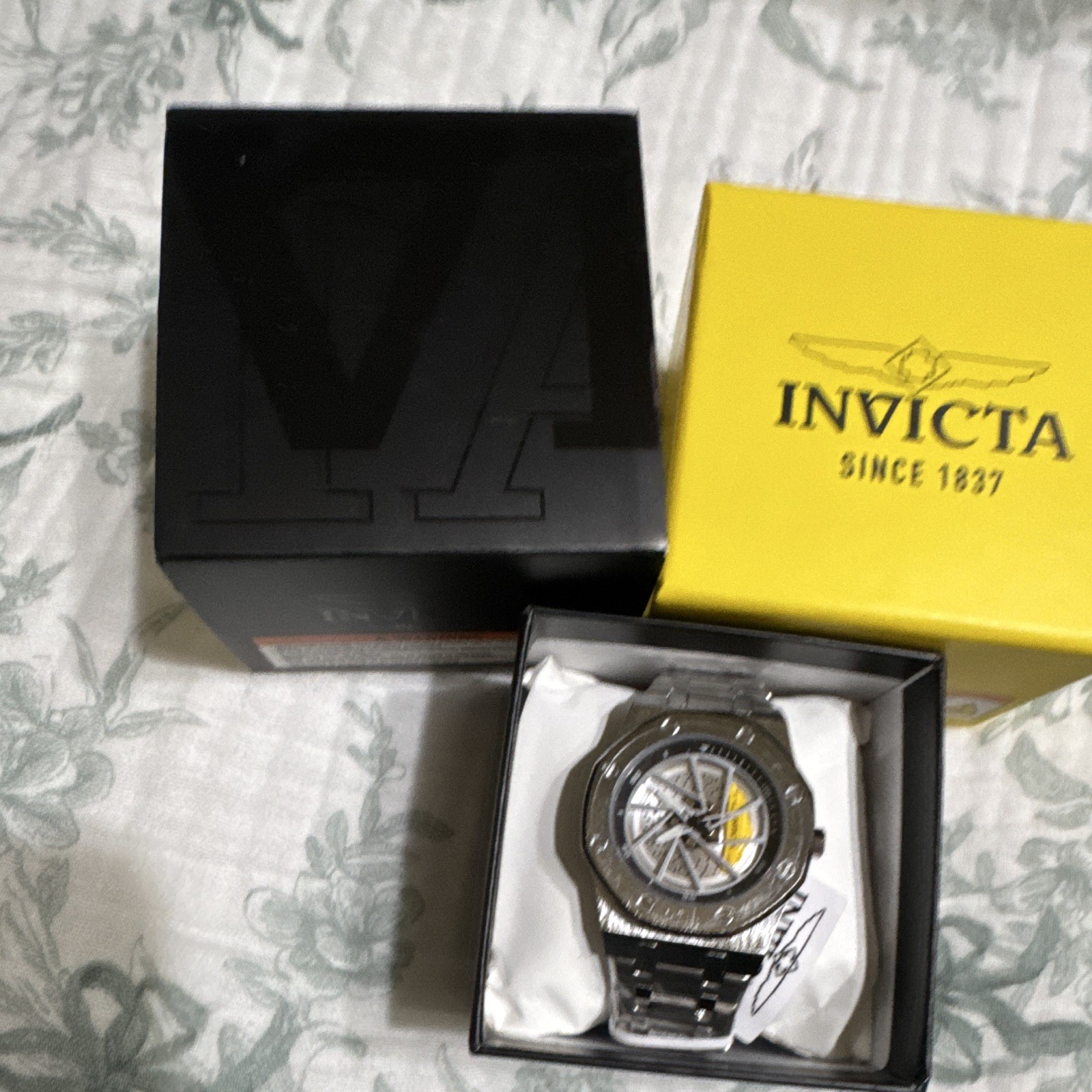 Invicta Speedway Rim Men’s Watch – 42mm Quartz, Skeletal Dial, 30m, Box