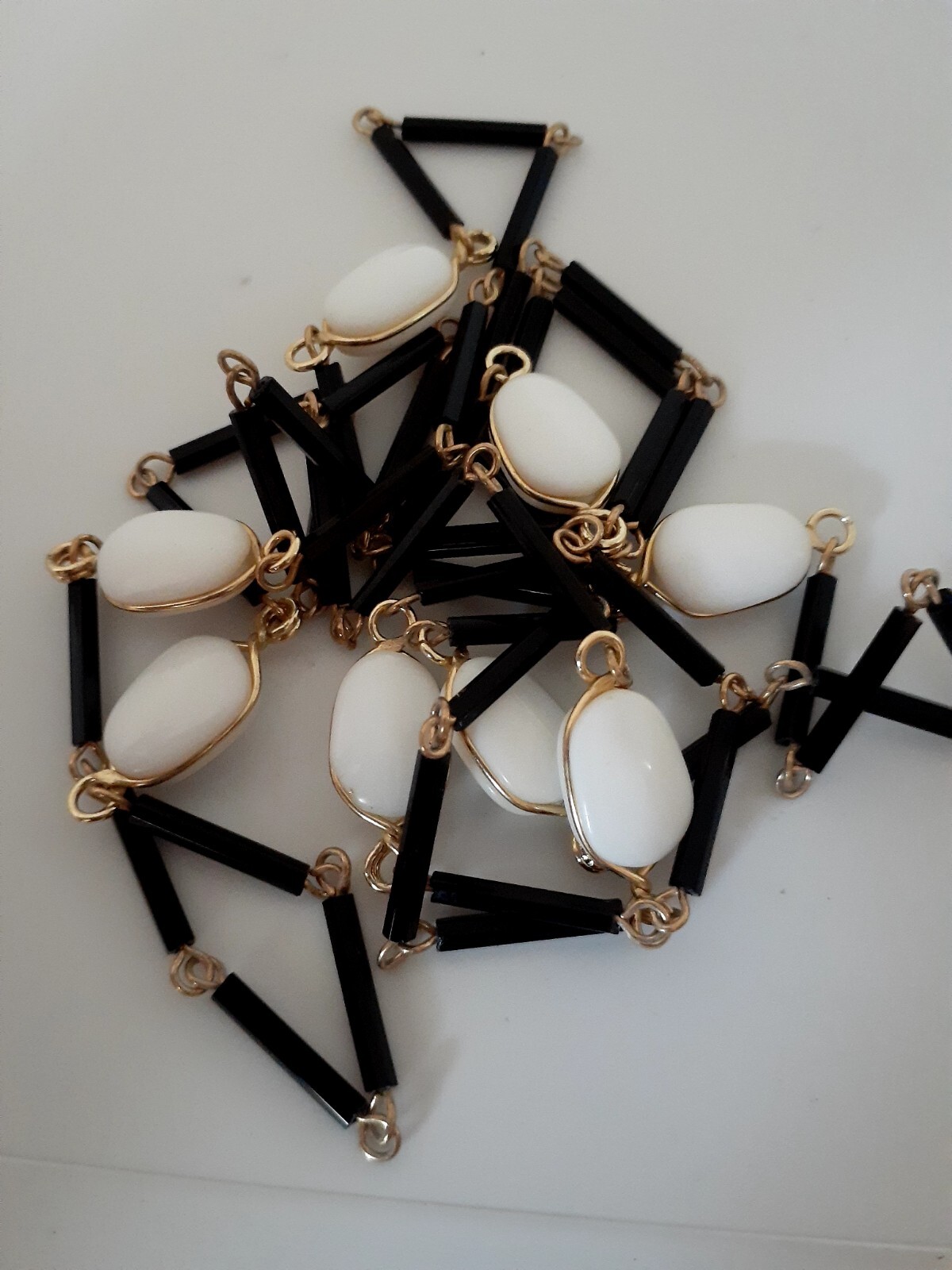 Vintage Black, gold & White lucite/glass Bead Single strand Station necklace 40″