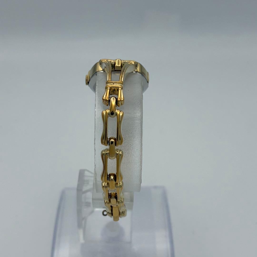 Working SEIKO wristwatch, gold and black, with new battery (A72)