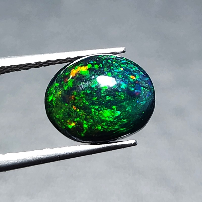 Ethiopian Welo Black Opal AAA+ Oval Cabochon Strong Green Play Loose 1.20Ct Gem