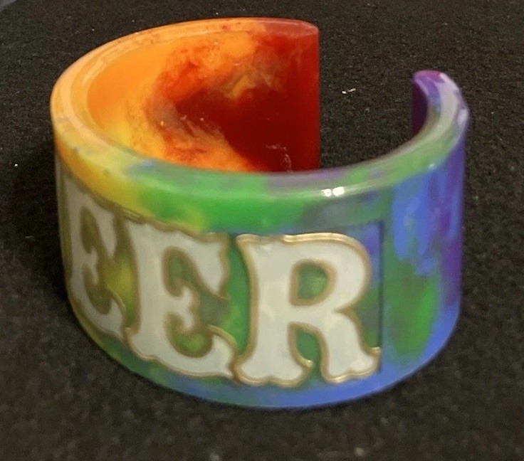 Rainbow “Queer” Cuff Bracelet, Grey And Gold Trim Text, MiaChavi Geekery