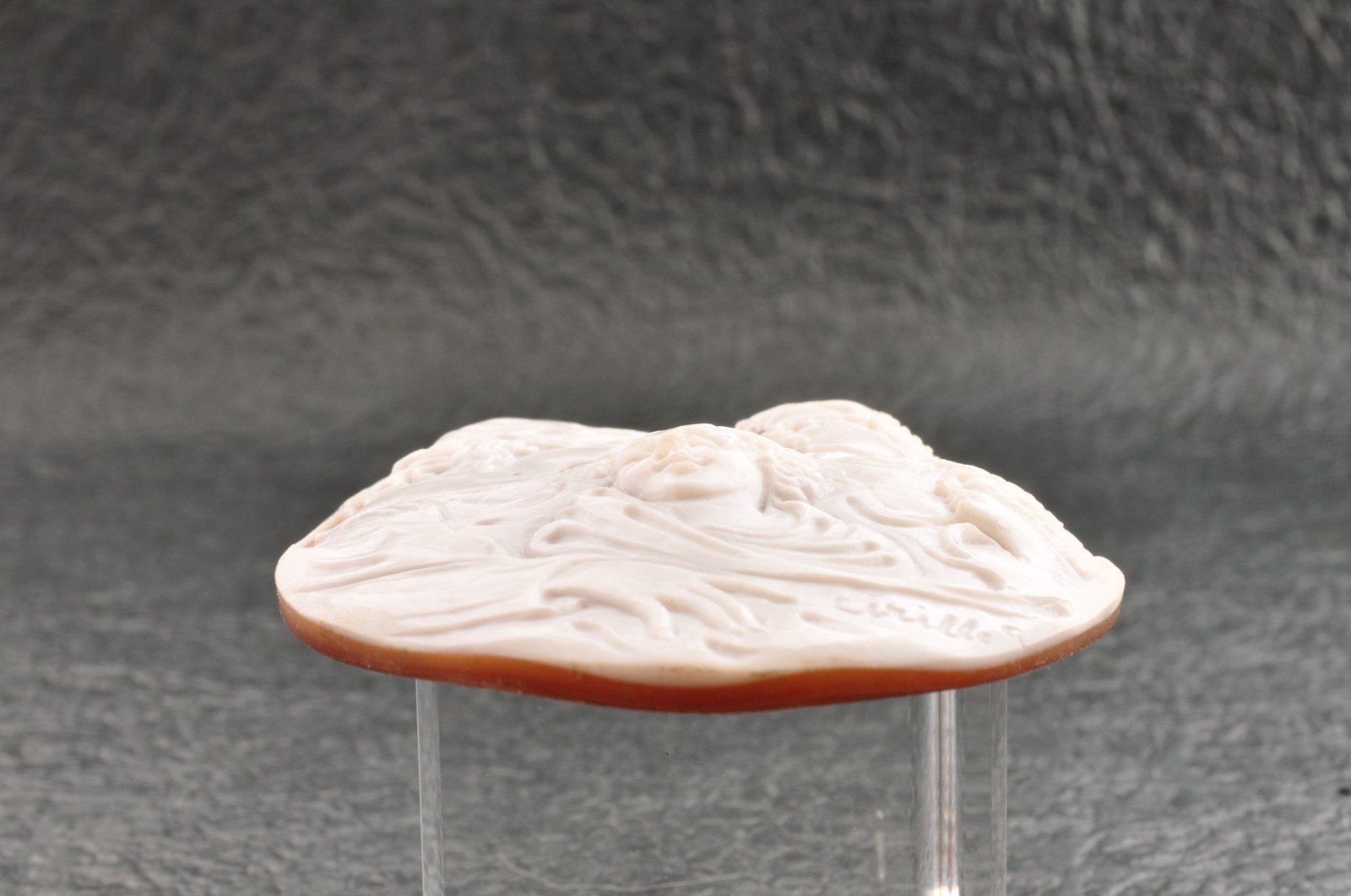 Vintage oval shape shell cameo “Brothers and Sisters” (115.0ct), sign by artist.