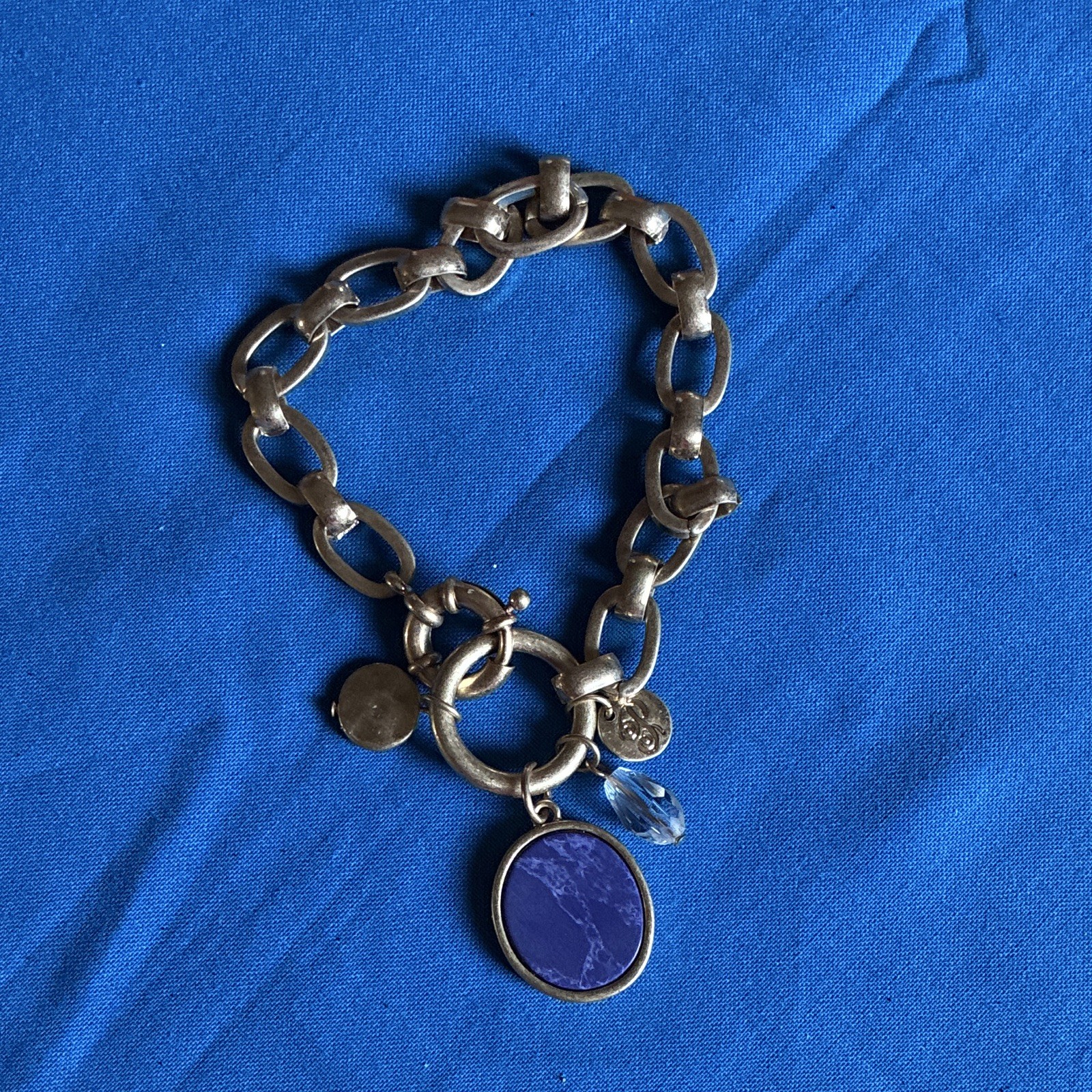 Gold chain necklace, and bracelet set with purple stone pendants