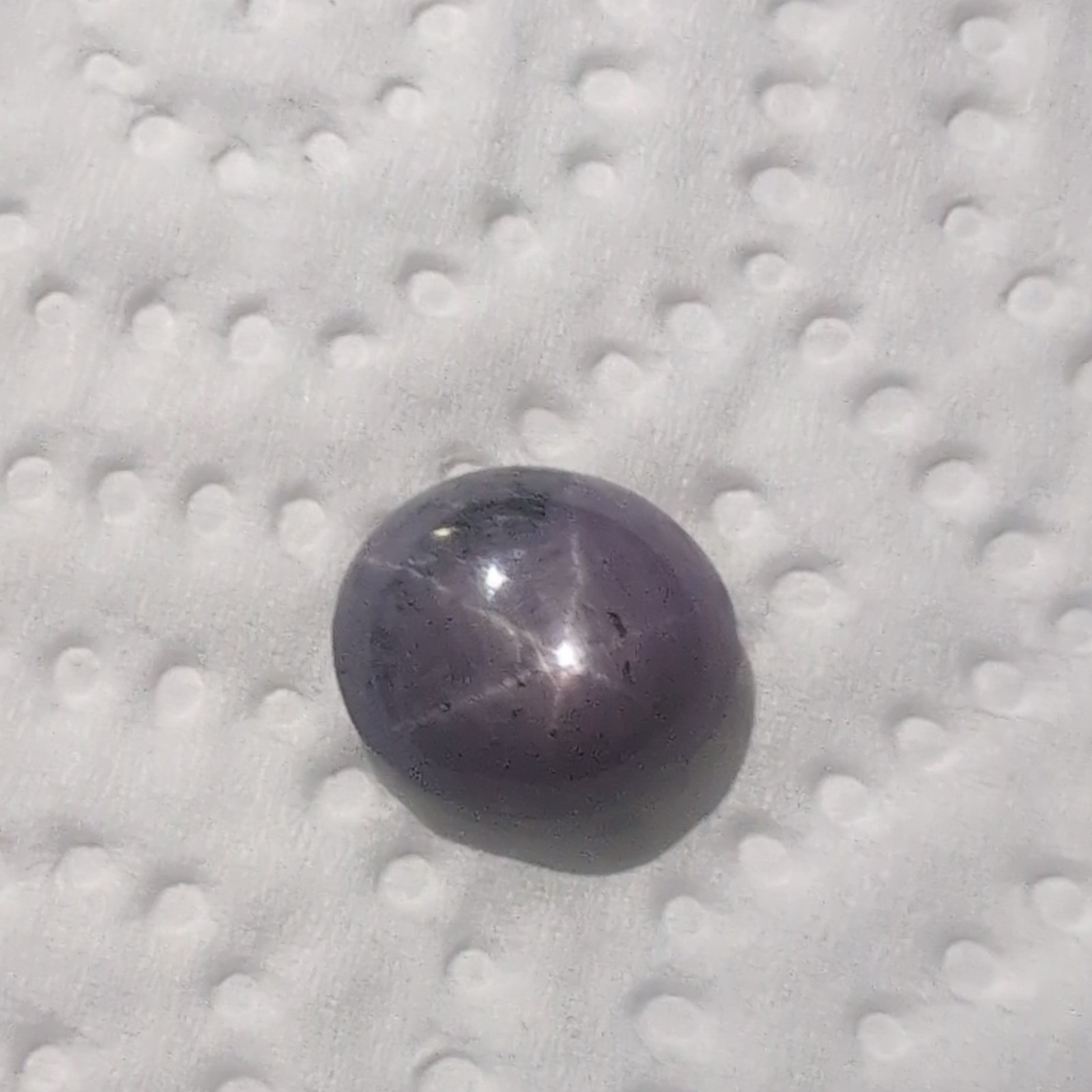 Purple Star Sapphire Found In Franklin N.C. 9.5 Carat Glows Under Blacklight.