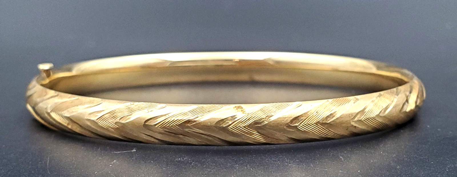 14K Bangle Bracelet, Open Hinge Design, Diamond Cut Finish 1/4 inch wide.