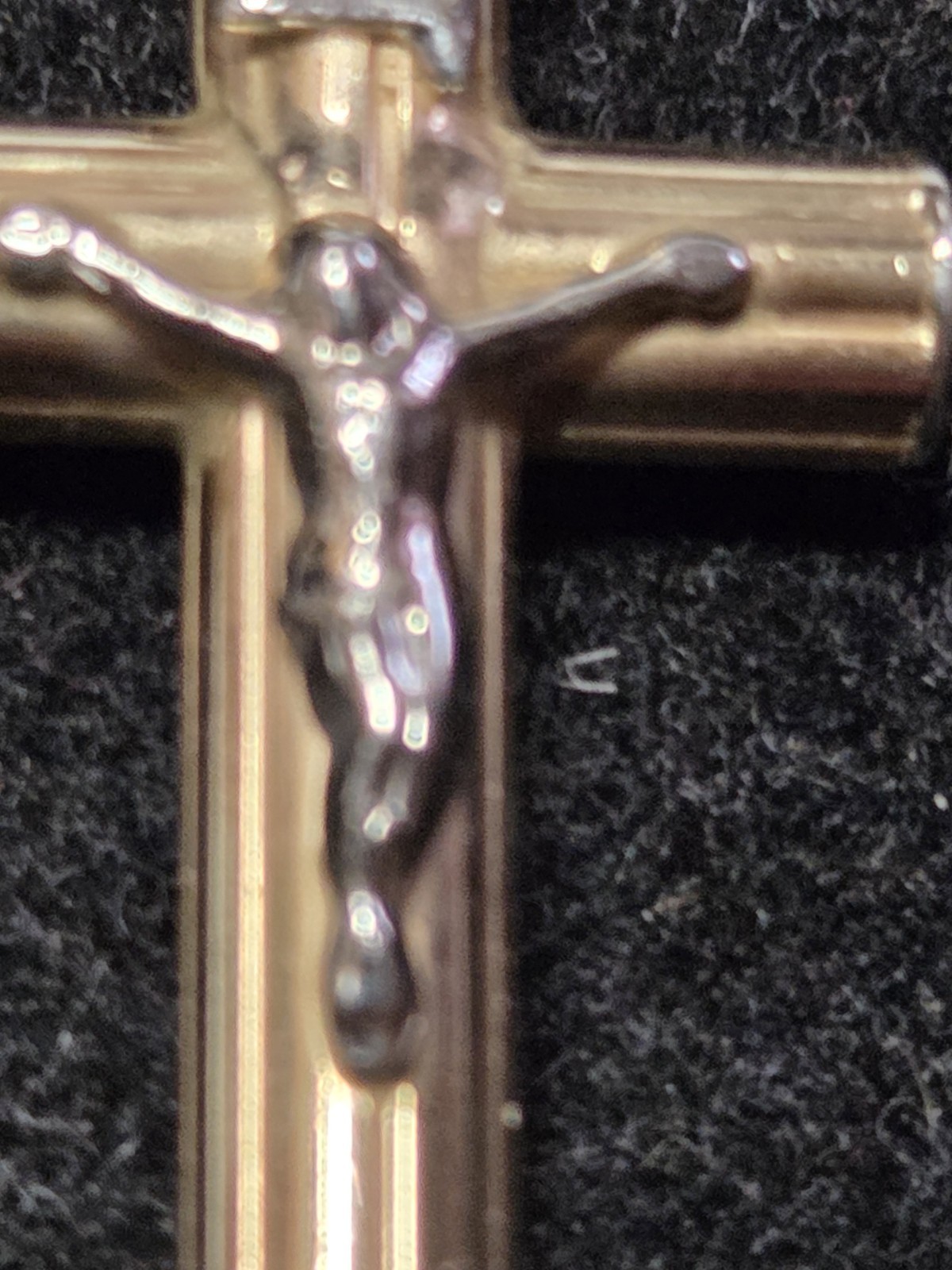 14 KT GOLD RELIGIOUS CROSS. 3.2 Grams