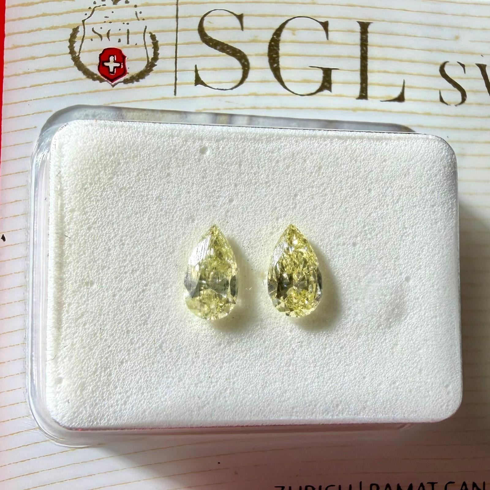 Natural Fancy Yellow Diamond Pair 0.36ct Pear VVS1 SGL Certified 5*3mm