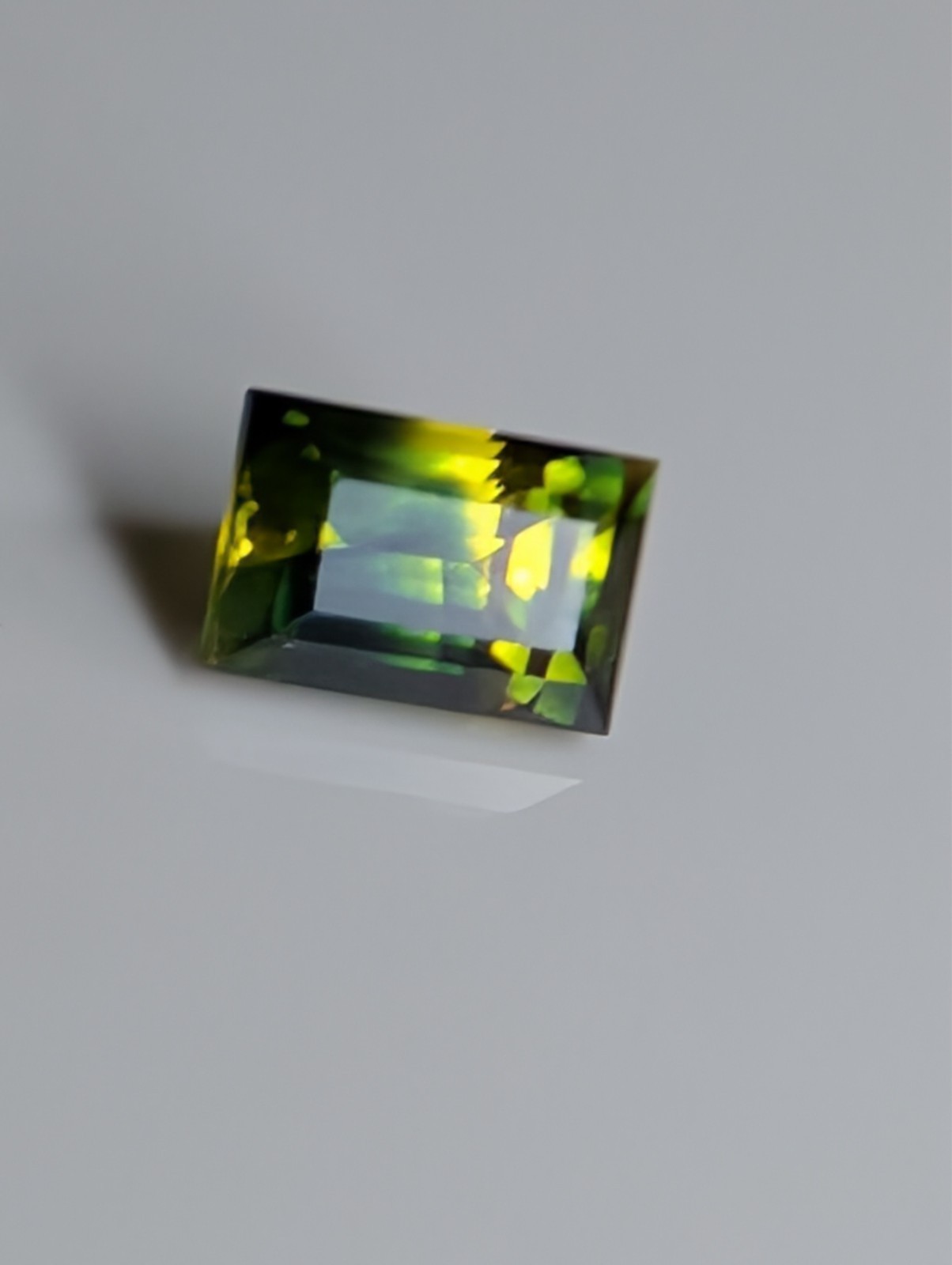 USA seller .63 IF Parti Sapphire faceted gemstone
