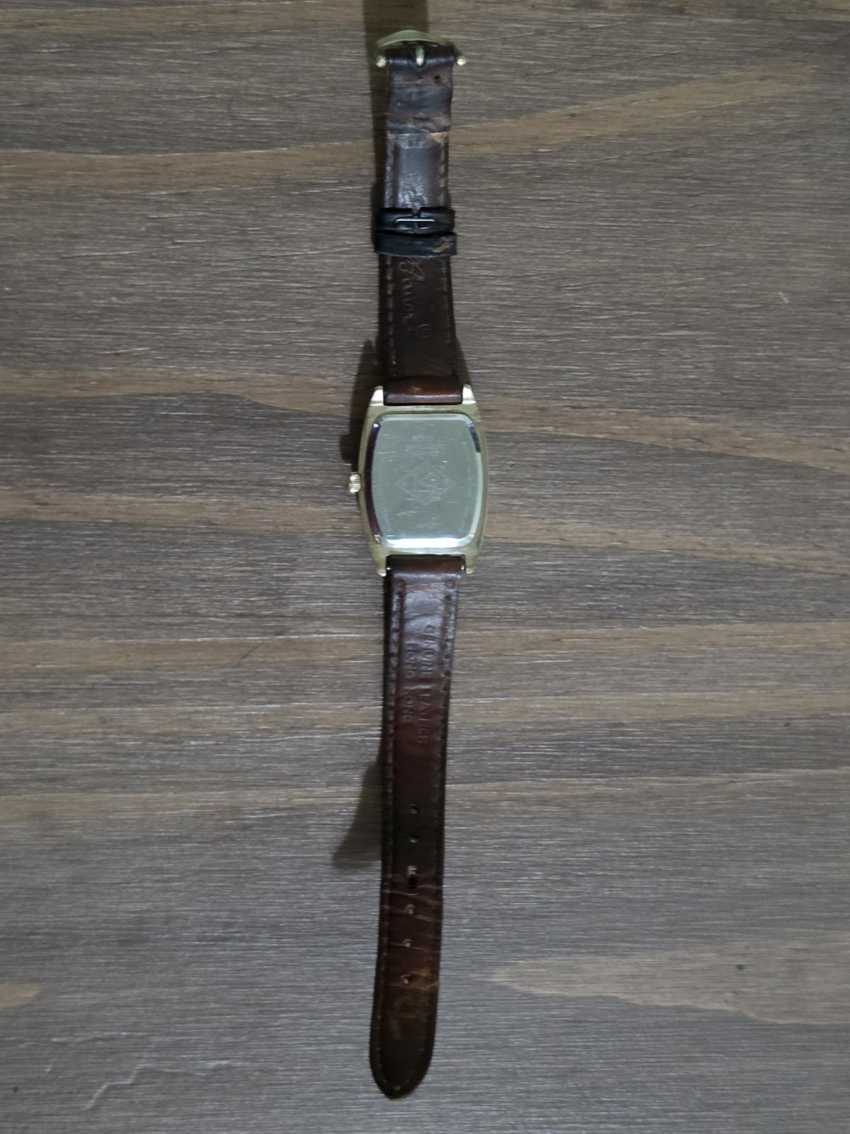 Vintage Eddie Bauer Watch Model 3556: Tonneau (barrel-shaped) Gold Tone Leather