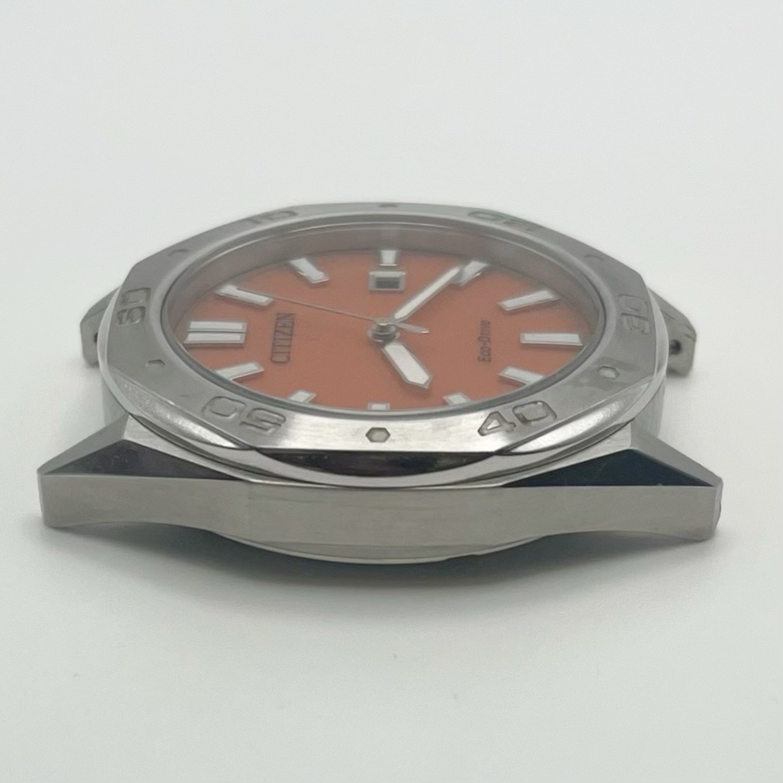 Citizen Eco-Drive Quartz Orange Waffle Dial Date 10 BAR WR E111-009R501 42mm