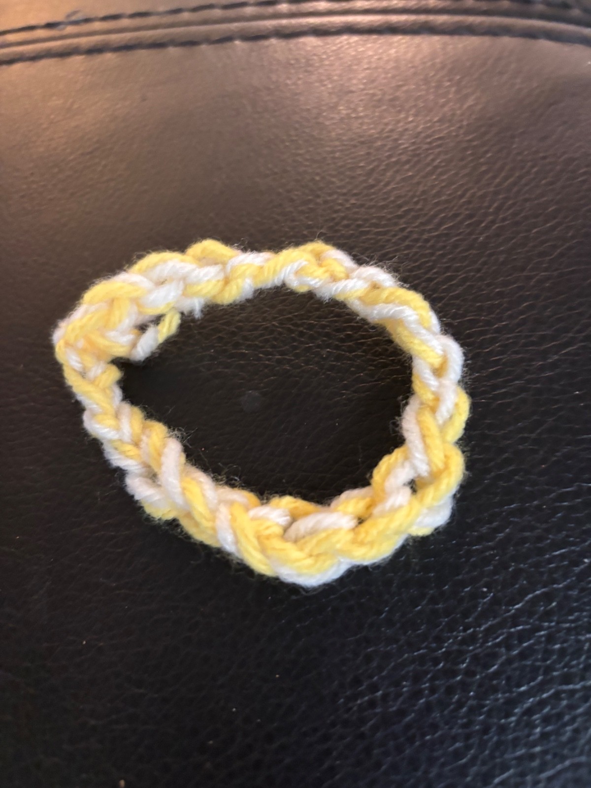 Handmade crochet yellow and white bracelet 18 stitches in width. Stretch to fit.