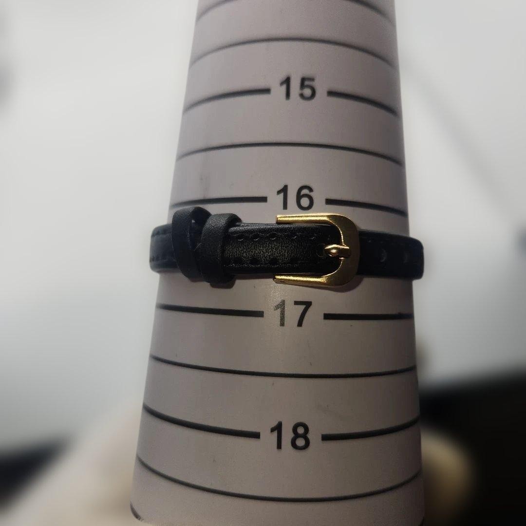 Seiko working ladies’ quartz watch, gold and black oval.