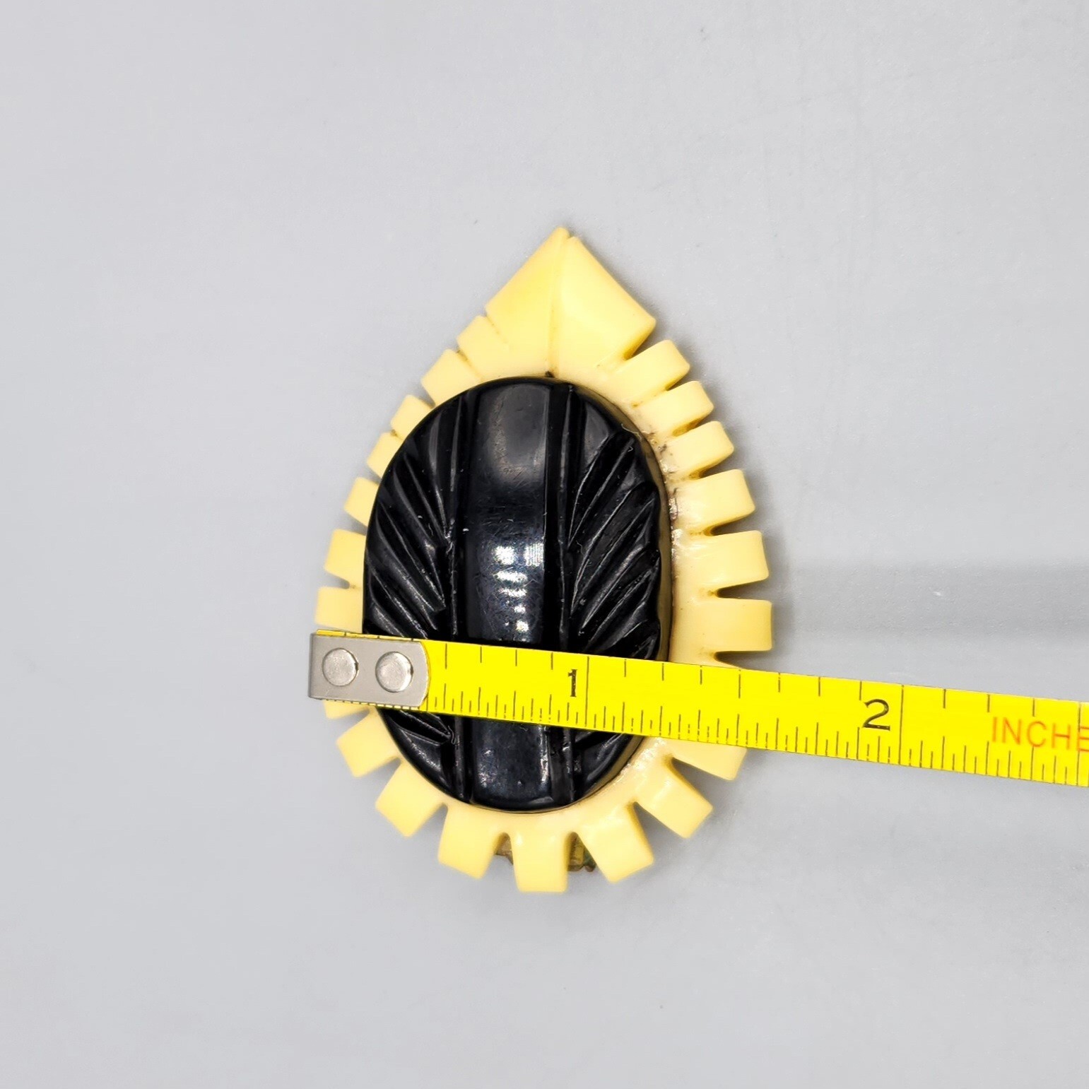Late Art Deco Retro Black Cream Carved Celluoid Teardrop Dress Clip