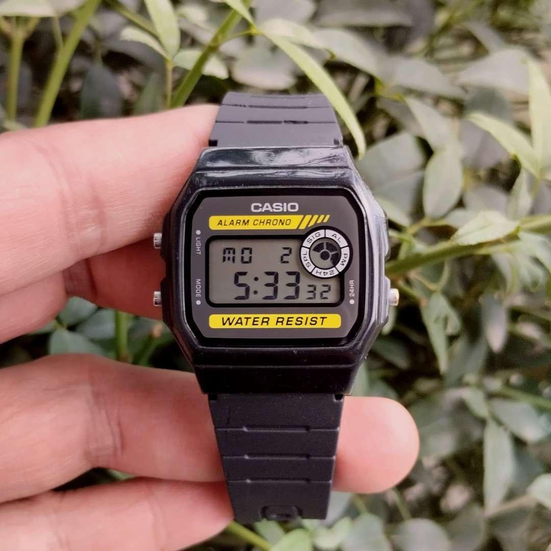 Casio F-94WA-9 Black Digital 30M WR Alarm Backlight Stopwatch Gold Accent Resin