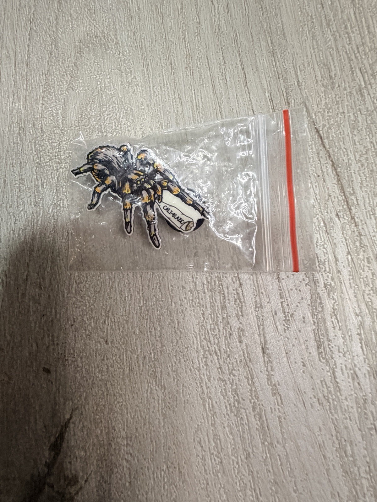 Signed Spider Pin “CAL BLAZE” Scroll Design, Black/Gray/Yellow/White