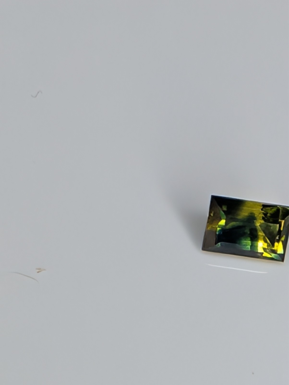 USA seller .63 IF Parti Sapphire faceted gemstone