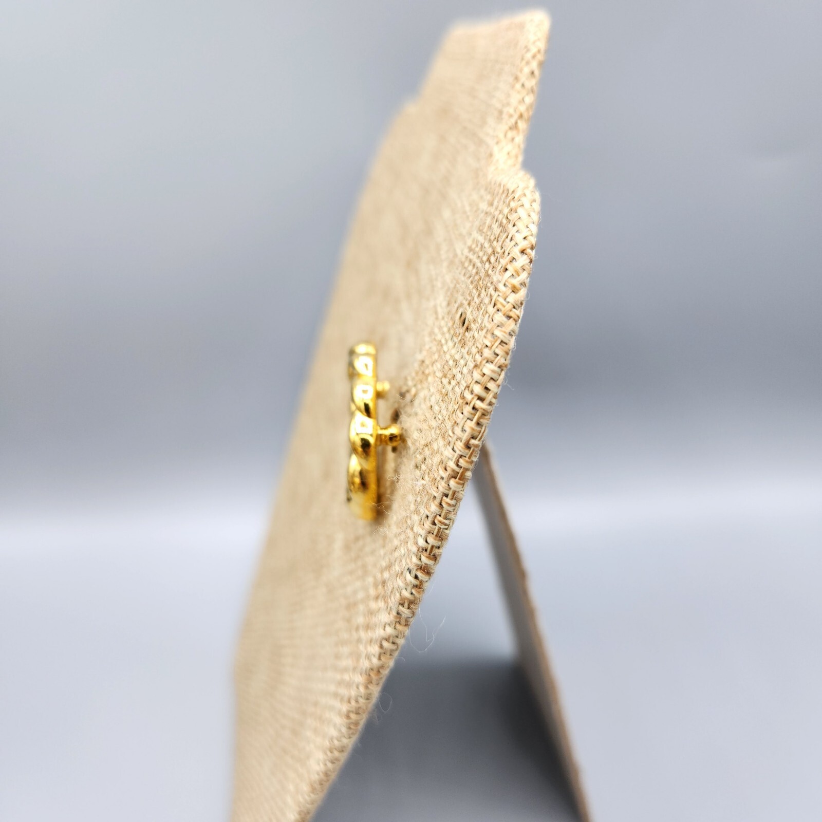 Crown Trifari Polished Gold Tone Crystal Pave Open Circle Twist Brooch
