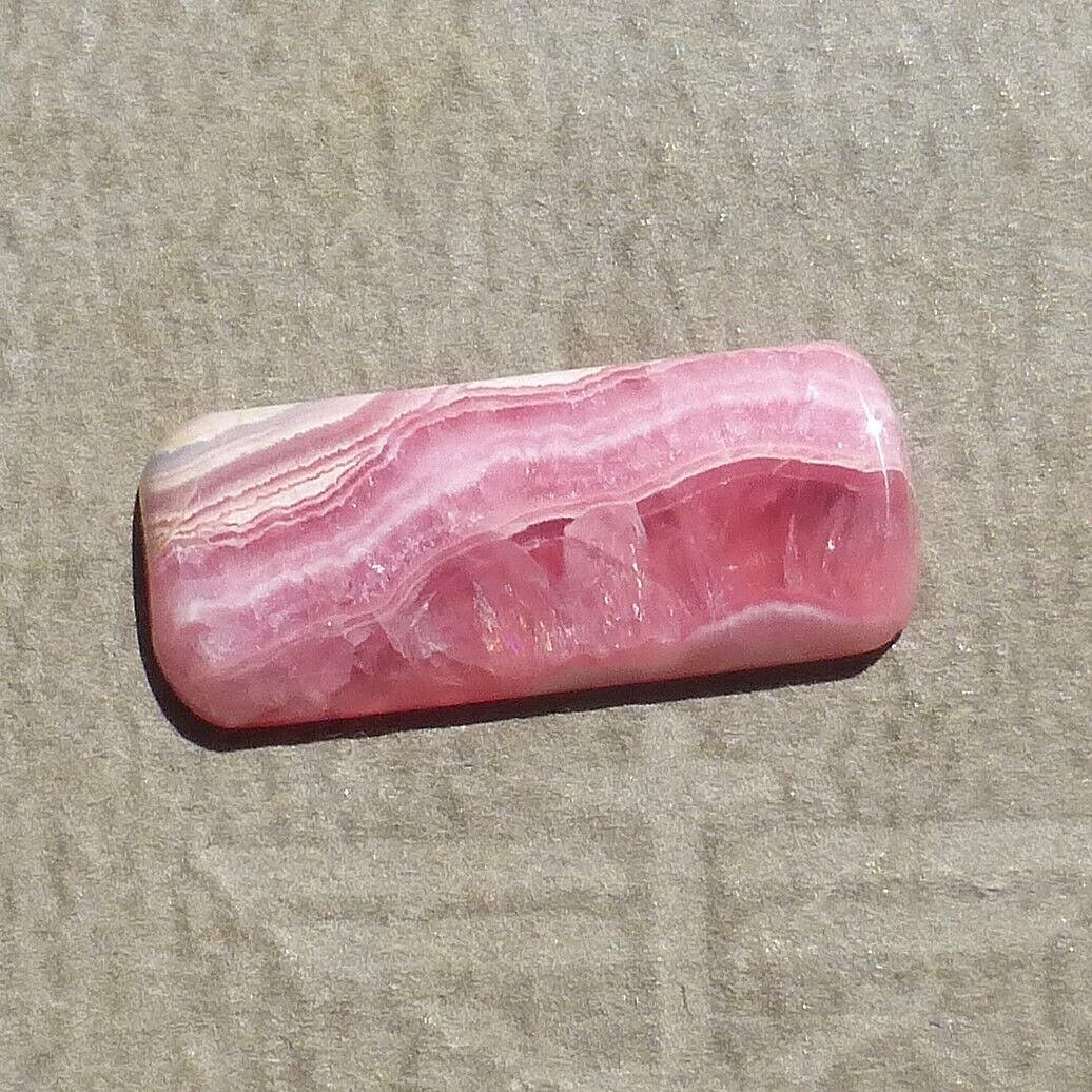 Pink w/calcite banding natural Rhodochrosite cabochon Argentina (27.60 carats)