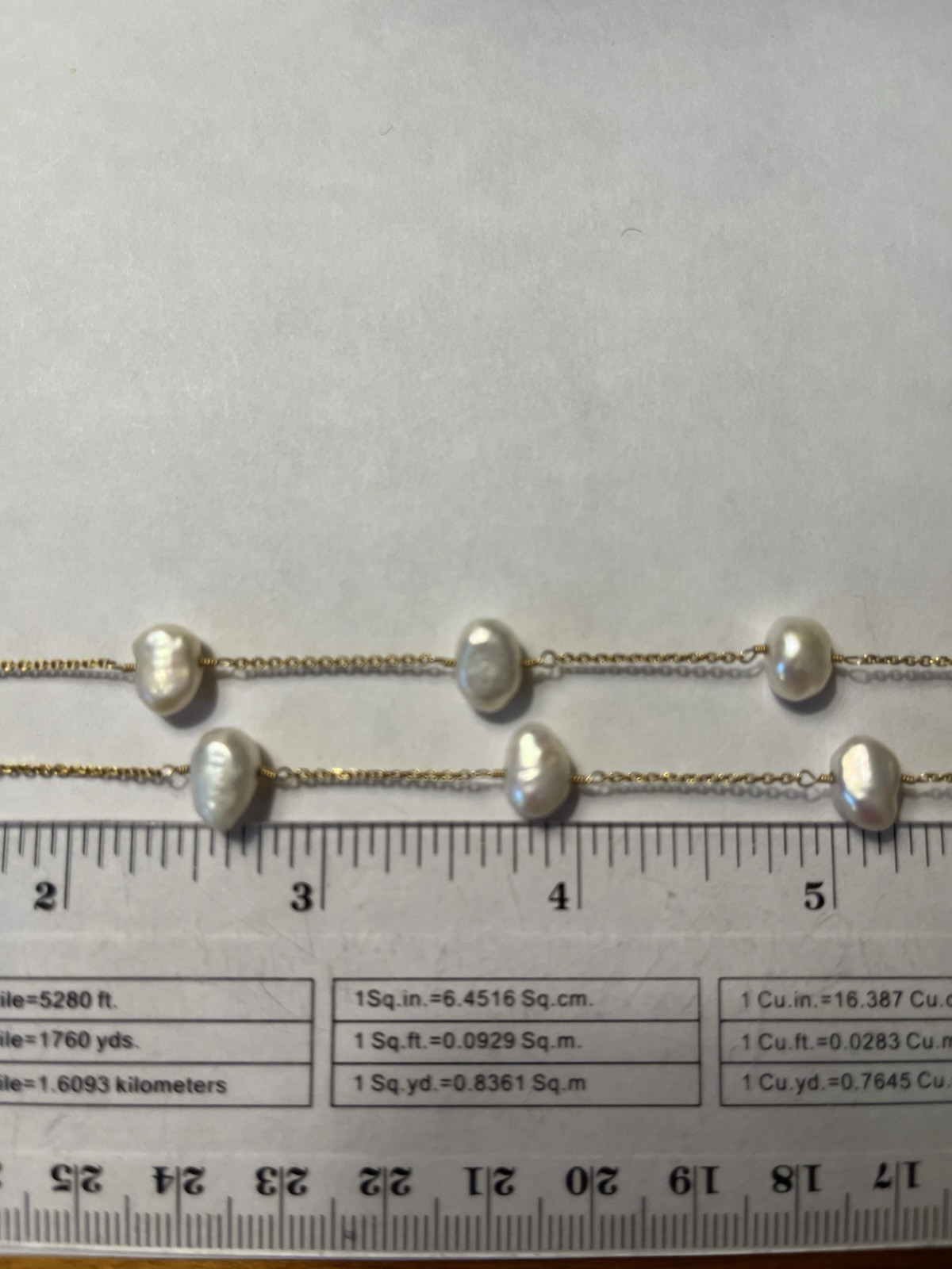 Stunning 14K gold 18″ pearl station necklace heavy 8.8 Grams.