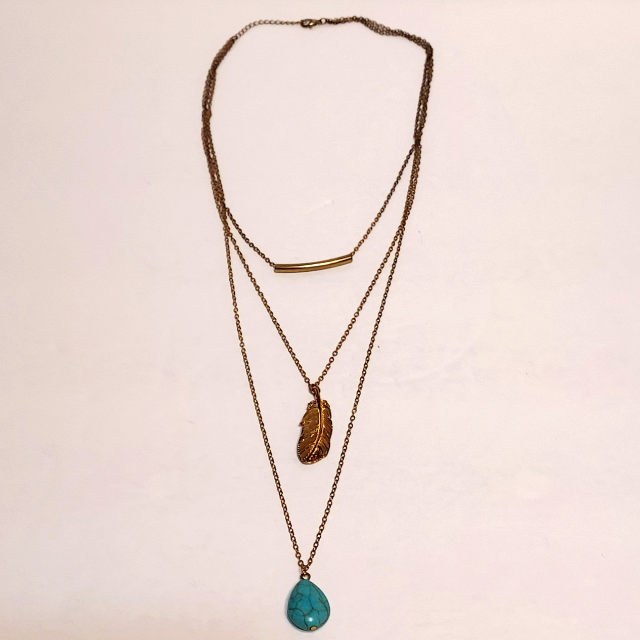 Multi Layered Gold Necklace With Feather & Turquoise Stone