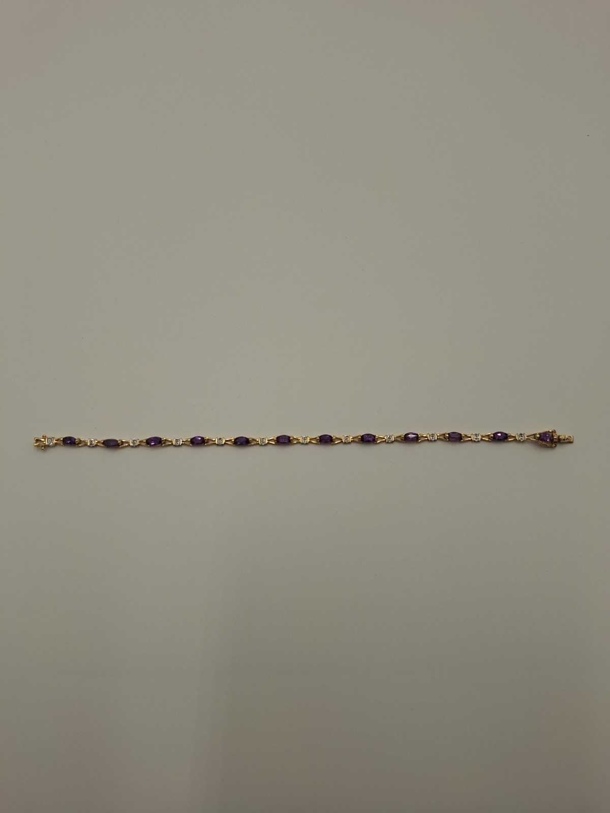 10 K Yellow Gold And Amethyst Bracelet Trio 10.4 Grams Total Weight