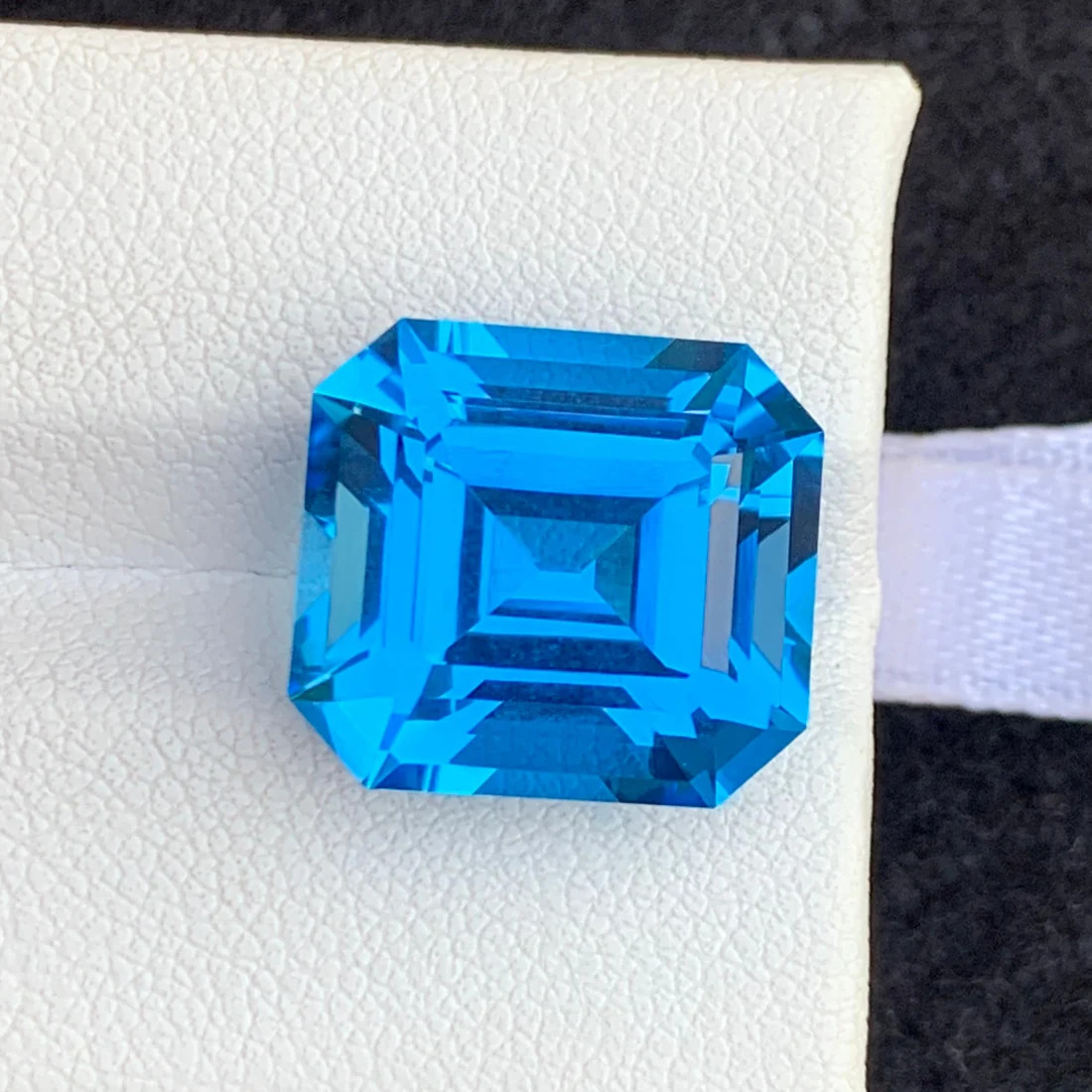 16.70carat Natural Electric Swiss Blue Topaz With emerald cut origin from Afric