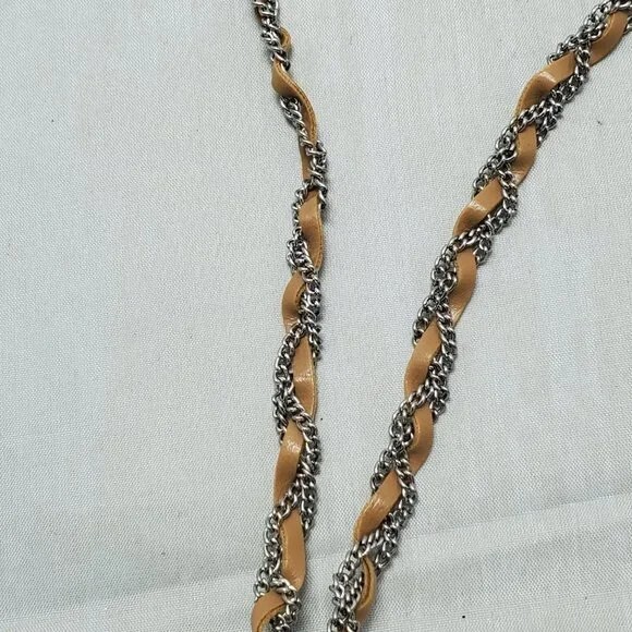 BKE tan leather with silver chain braided neck with hanging charms 27 inch NWT