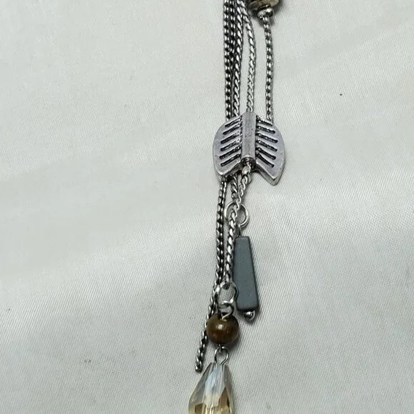 BKE tan leather with silver chain braided neck with hanging charms 27 inch NWT