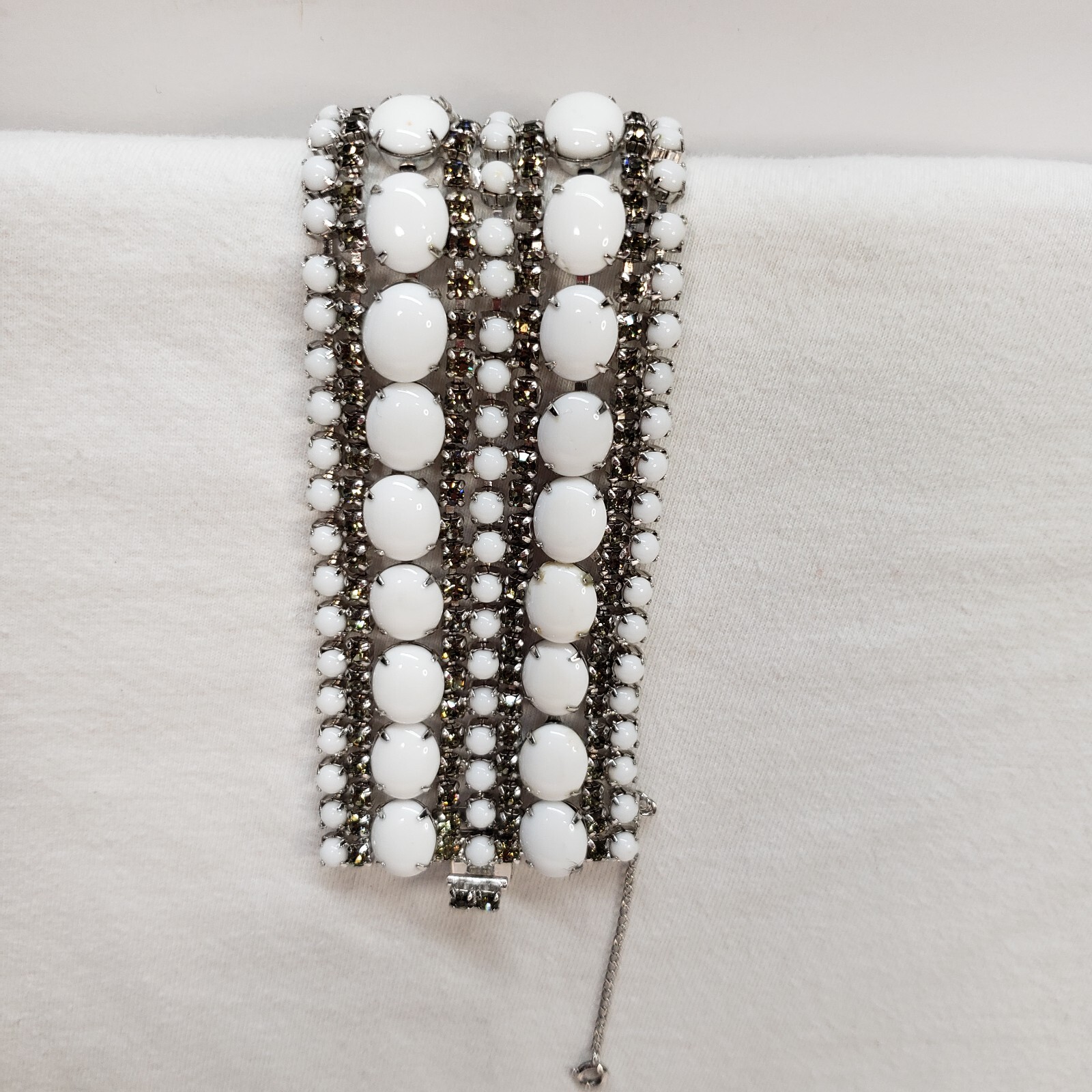 Milk Glass Bracelet With Crystal Rhinestones, 9 Rows. 7in Long 2in Wide