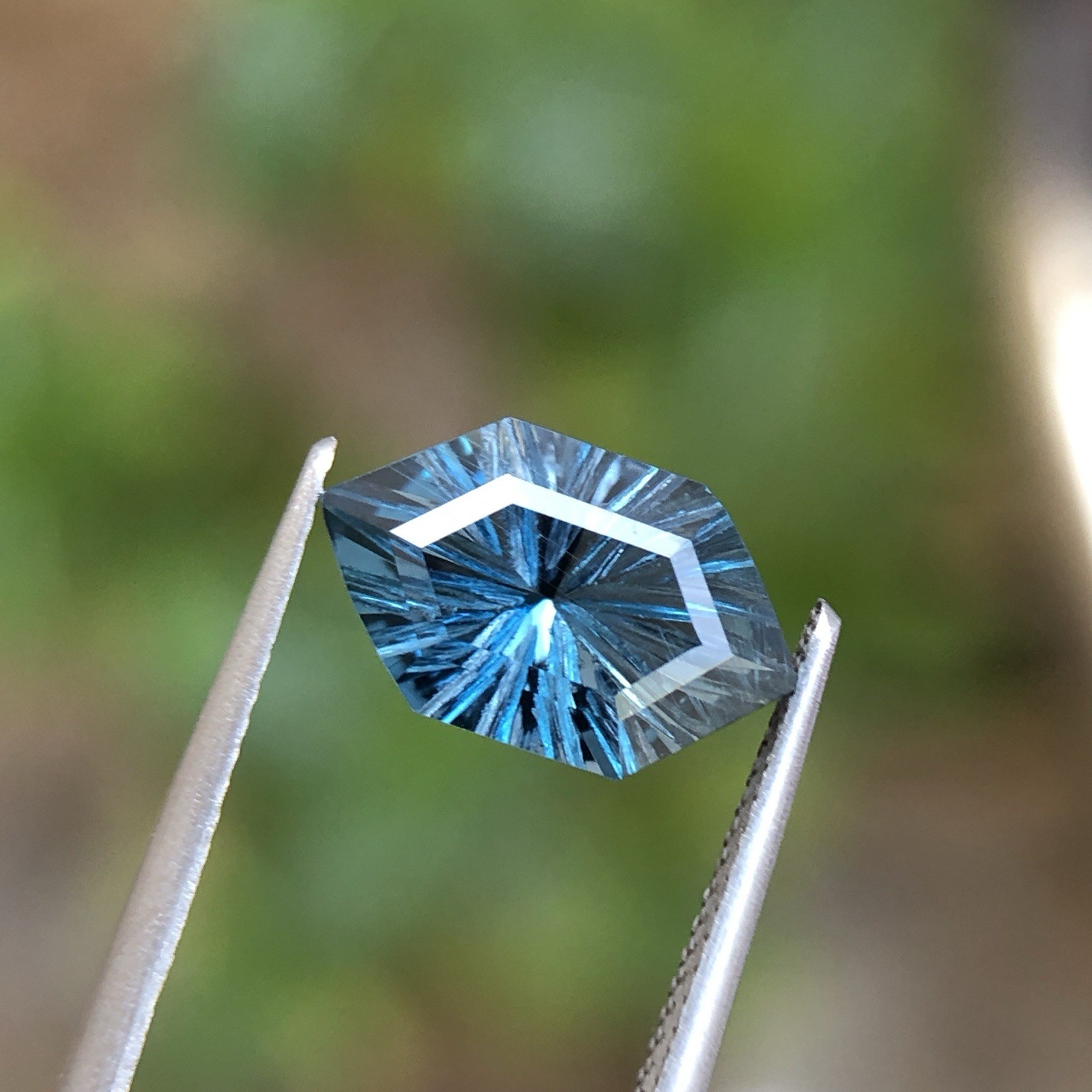 Natural London Blue Topaz Fantasy Cut Long Hexagon 12.5 MM 3.90 Carat.