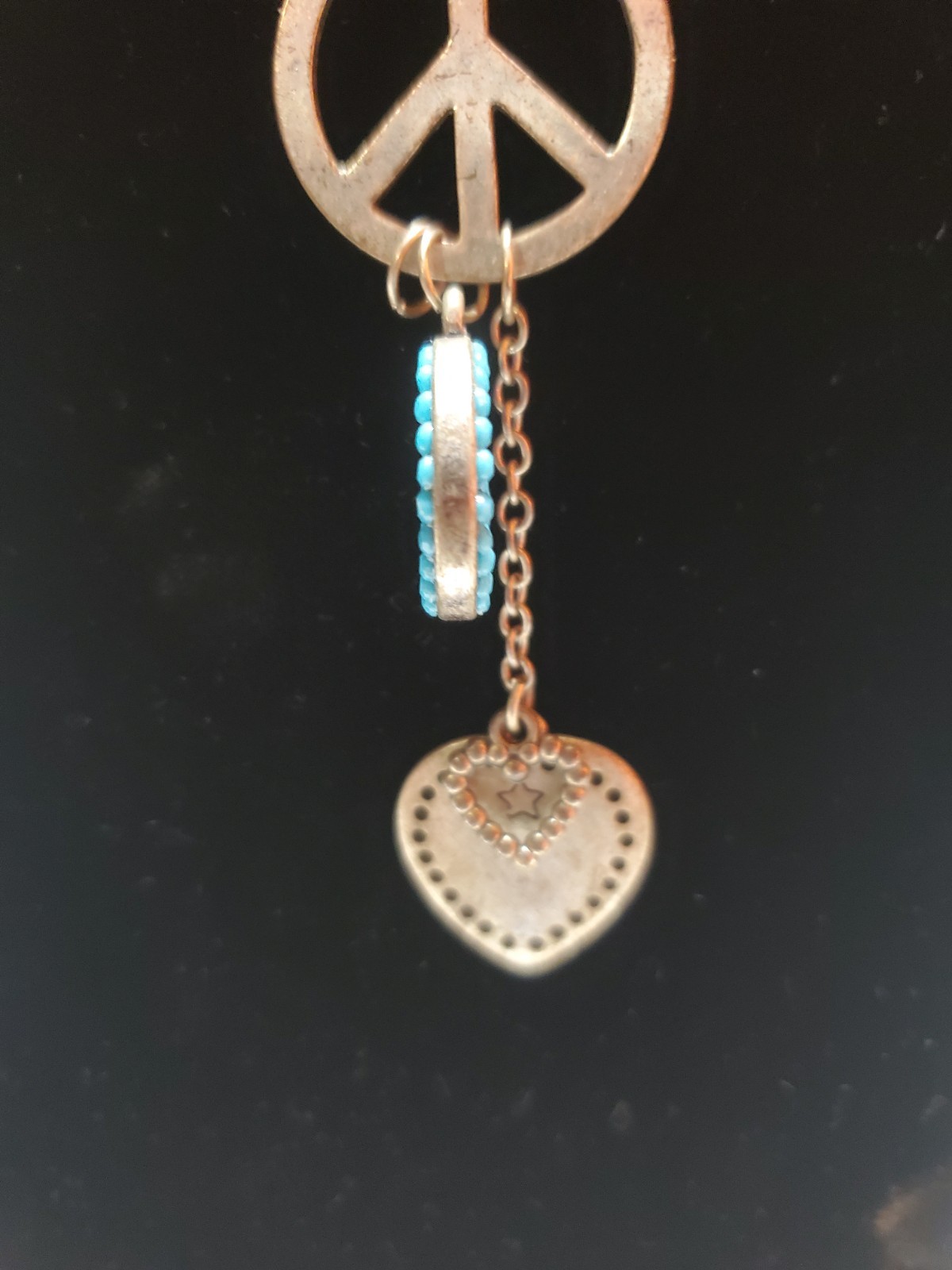 vintage necklace from 60-70’s original hippy days. peace and love signs.