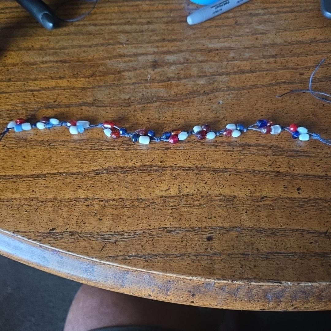 Patriotic red white & blue 7 inch bracelet. Size is adjustable Tie one