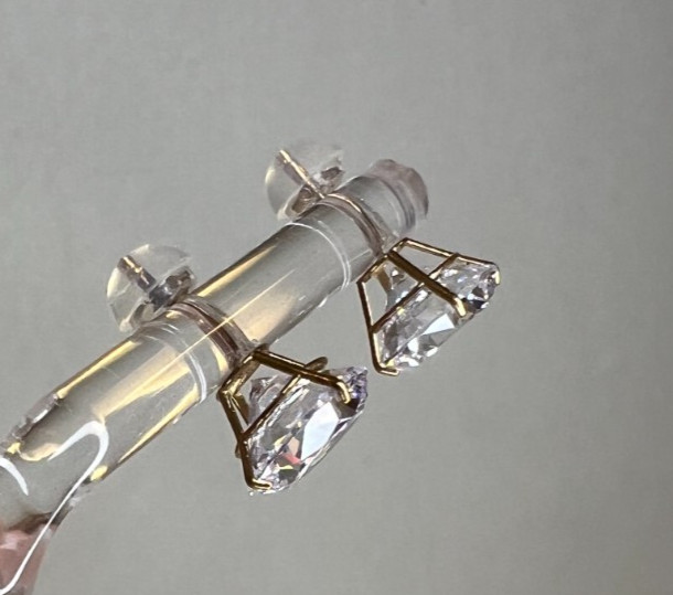 Bella Luce Cubic Zirconia 9.00ctw round 10K yellow gold stud earrings