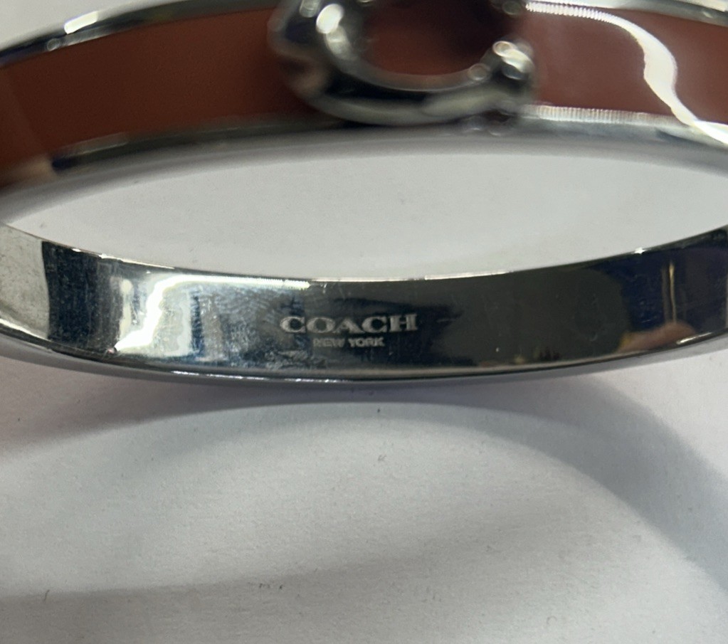 Coach Signature C Logo Hinged Bangle Bracelet in Orange Enamel & Silver