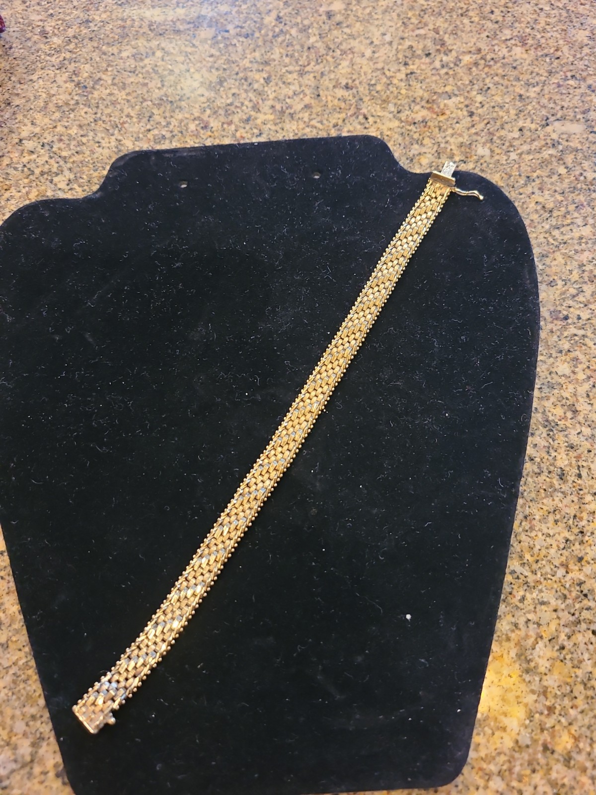 Bracelet in 14kt weave design. Imperial Gold. USA. 8 in w clasp. 22.69 g. 9mm