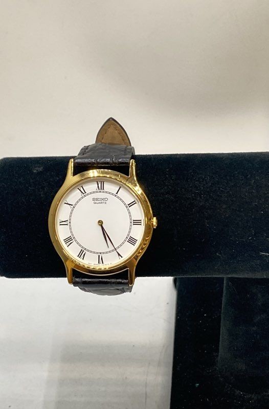 Seiko Quartz Men’s Dress Watch Gold Tone Roman Numeral White Dial 34.7mm Case