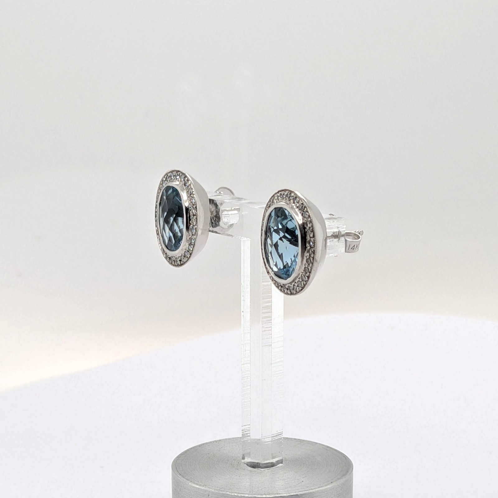 Aquamarine Stud Earrings with a Diamond Halo in 14k White Gold