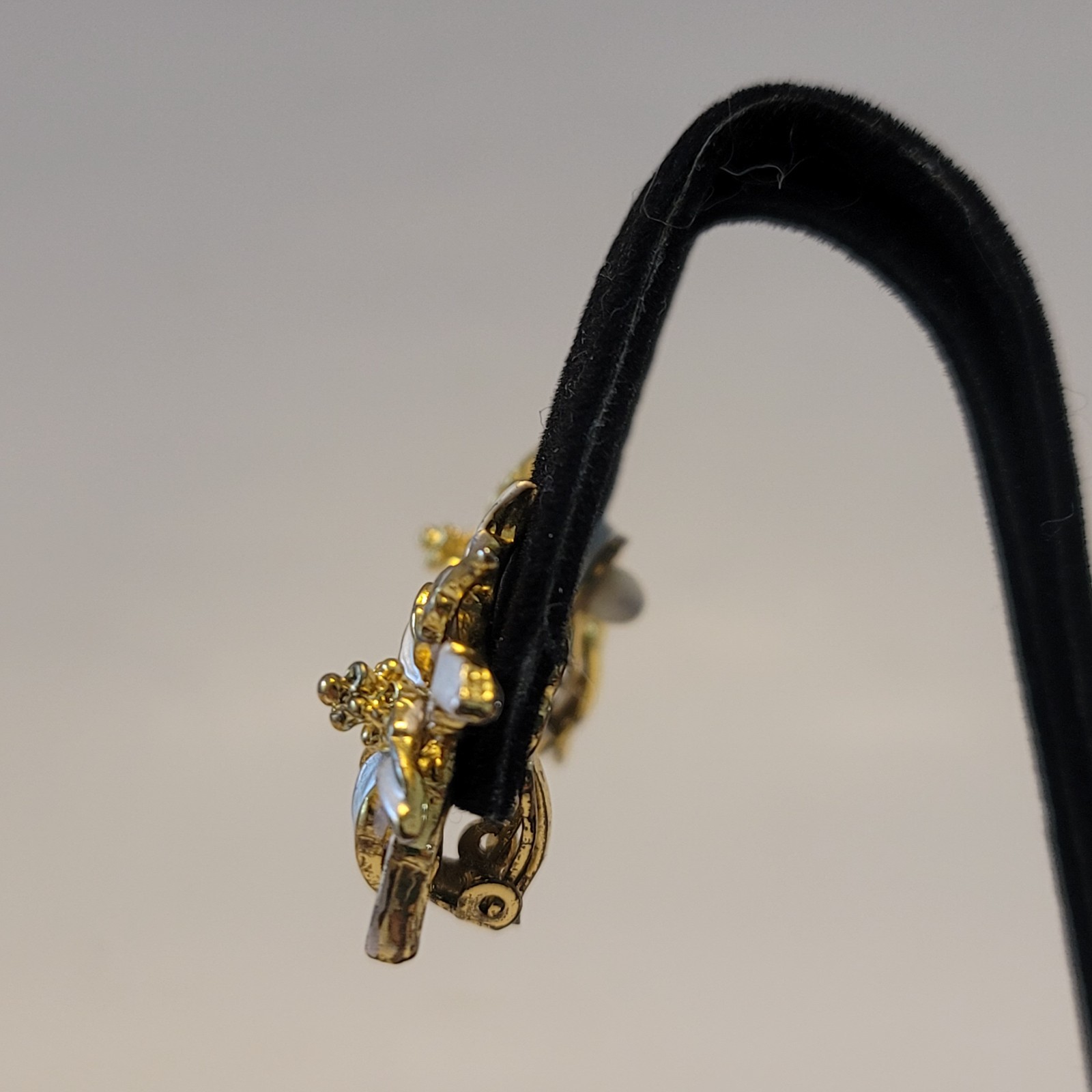 Vintage Clip On Earrings Gold Tone with White Enamel Edelweiss Blossom Motif